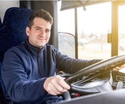 a bus driver smiles